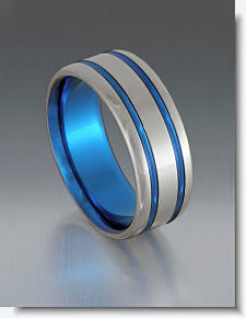 Blue titanium rings – the strange nuance in a grey dominated market